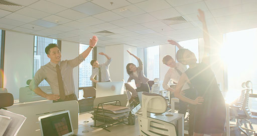 Successful Chinese business people exercising in office,4K