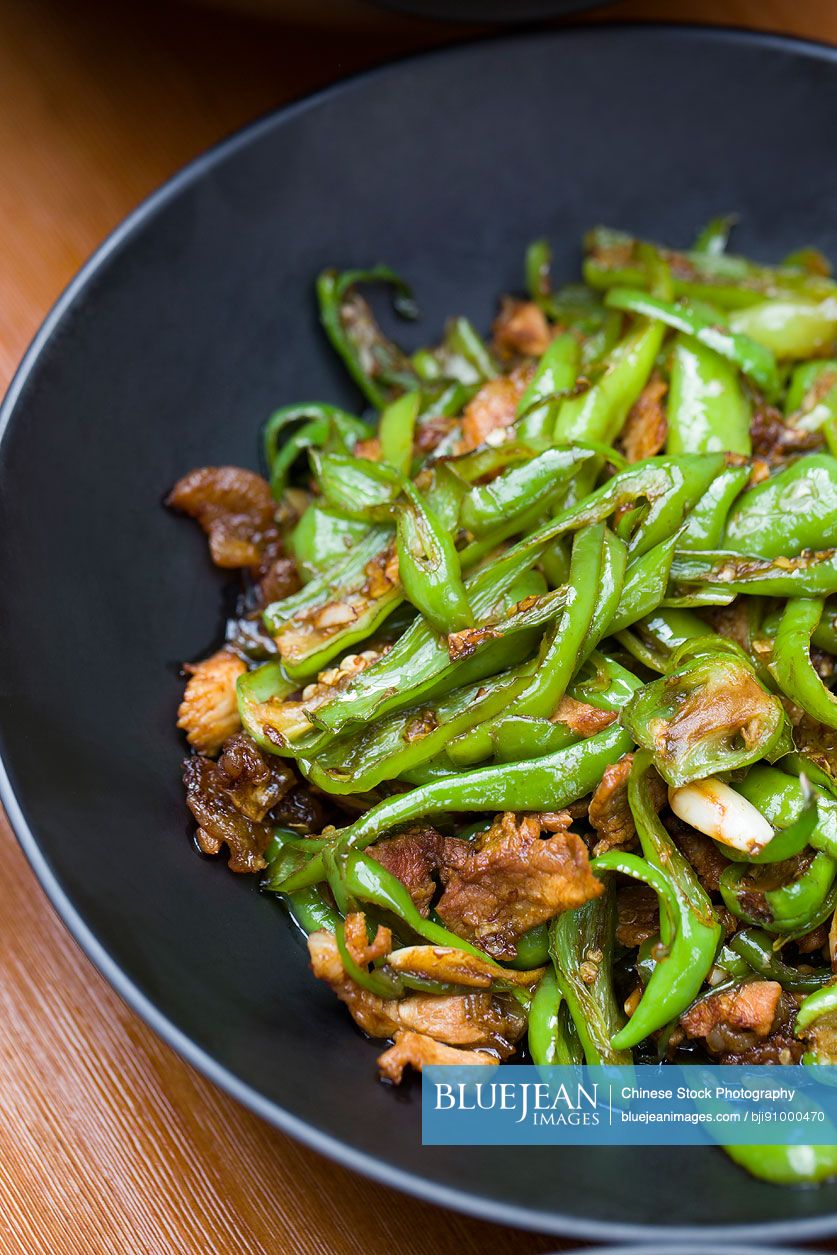 Chinese cuisine stir-fried pork with chili