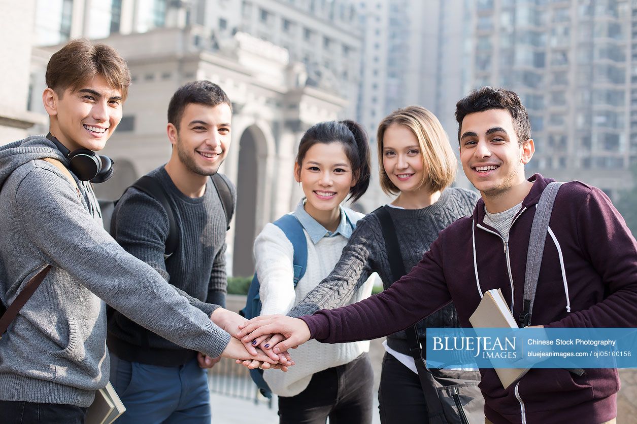 Cheerful abroad students on campus