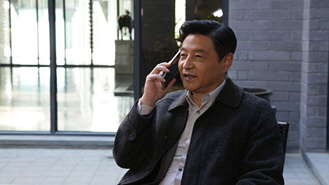 Mature Chinese man using smartphone,HD