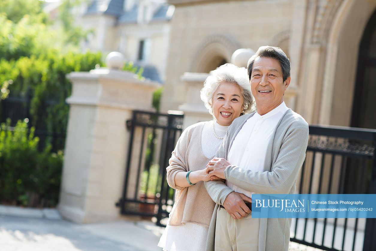 Portrait of cheerful senior Chinese couple