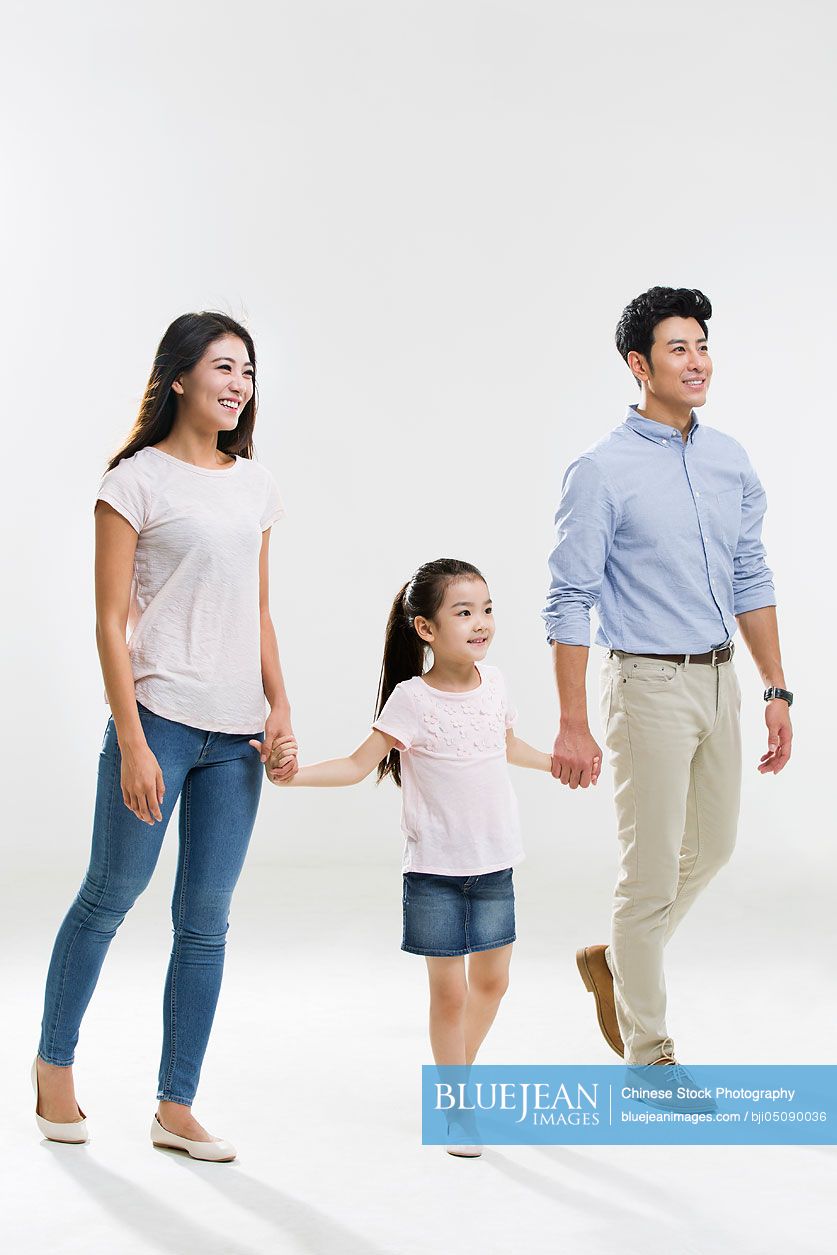 Cheerful young Chinese family