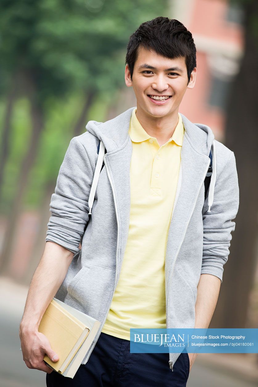 Male Chinese college student on campus