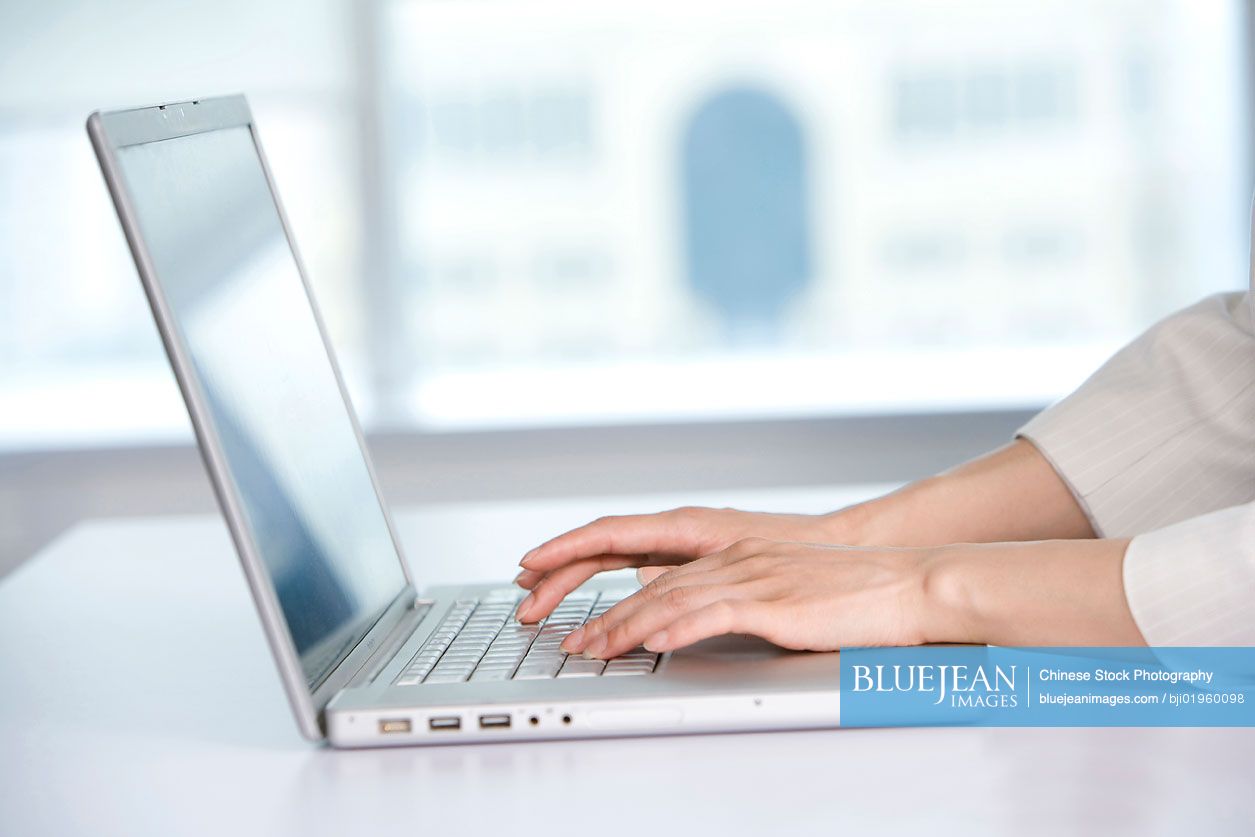 Office worker using her computer