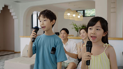 The family is enjoying their vacation and having fun at the hotel