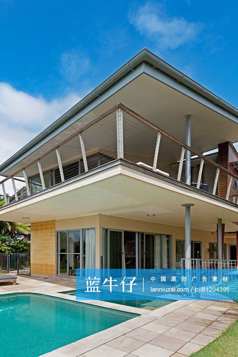 Swimming pool in front of house