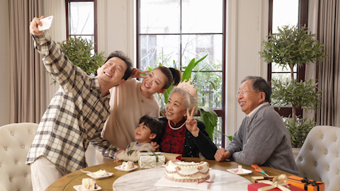 Family celebrating birthday with joy and laughter