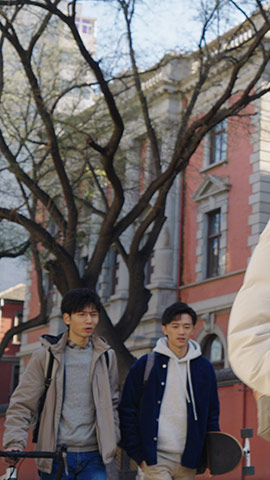 Happy Chinese college students walking and talking,HD