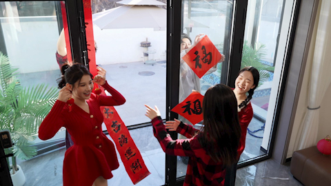 Young friends celebrating Chinese New Year together