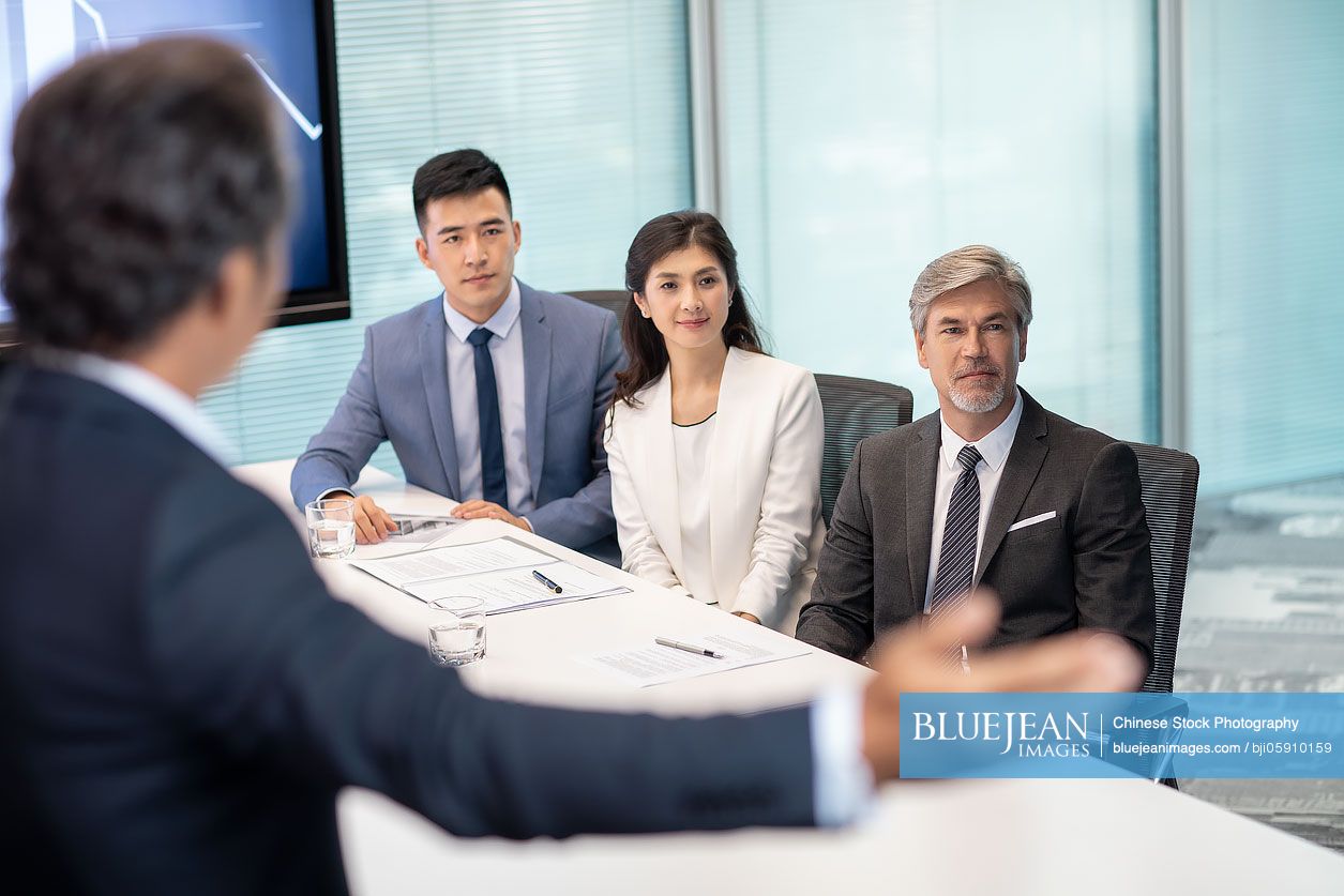 Business people having meeting in conference room