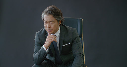 Successful Chinese businessman sitting on boss chair,4K