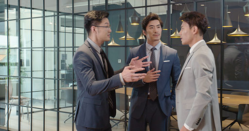 Successful Chinese businessmen talking in office,4K