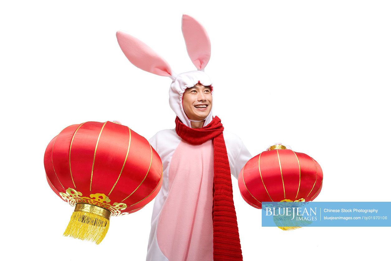 Mid-adult Chinese man celebrating the Year of the Rabbit