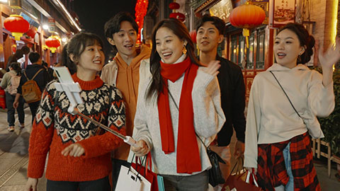 Happy young Chinese friends shopping for Chinese New Year,4K