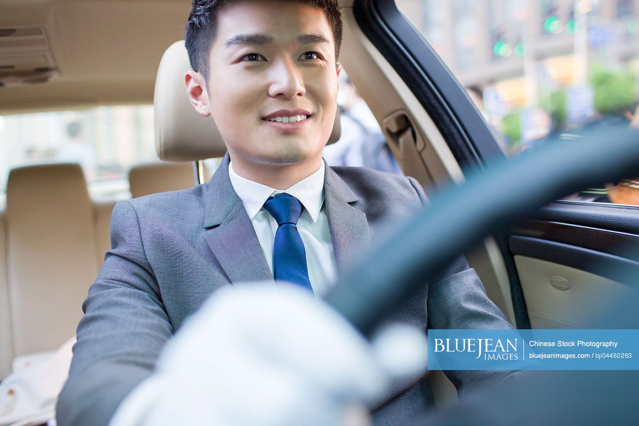 Chinese chauffeur driving car