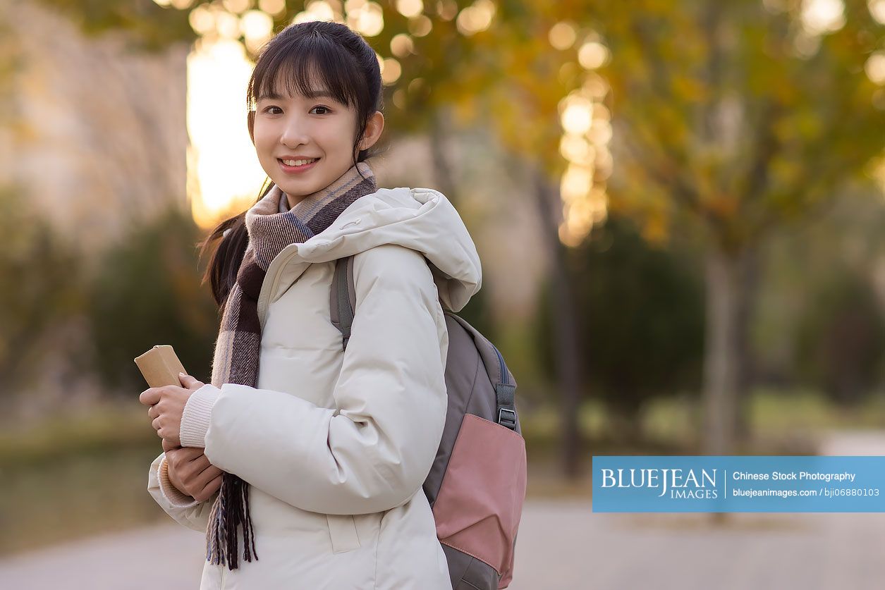 Portrait of cheerful Chinese college student