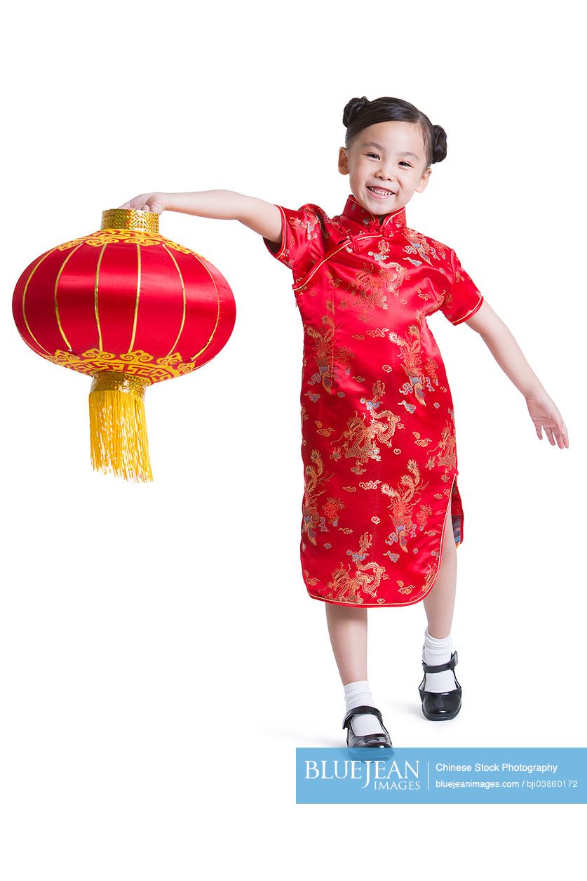 Cute Chinese girl with red lantern celebrating Chinese New Year