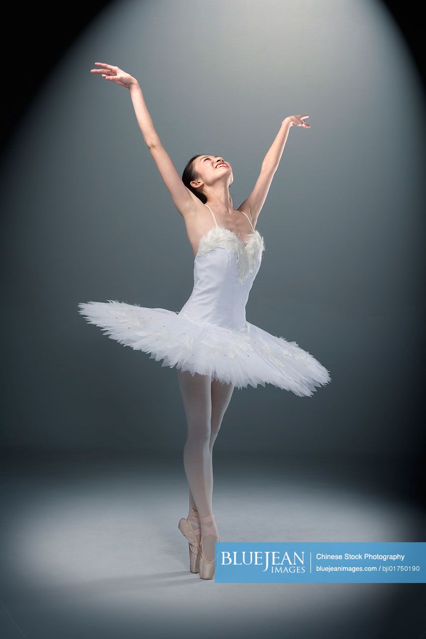 Chinese ballerina performing in the spotlight