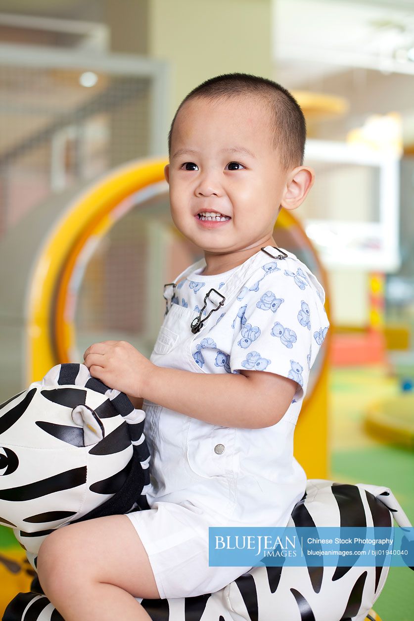 Chinese boy playing