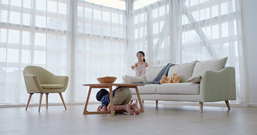 Chinese sibling playing hide and seek in living room,4K
