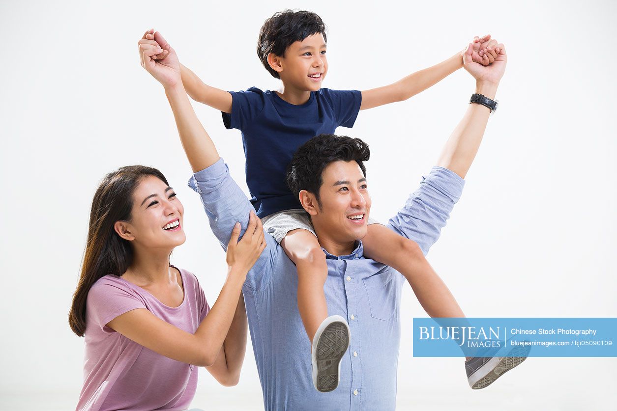Cheerful young Chinese family