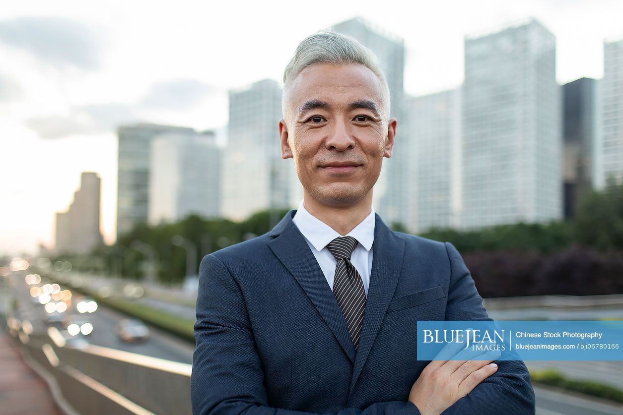 Portrait of confident Chinese businessman