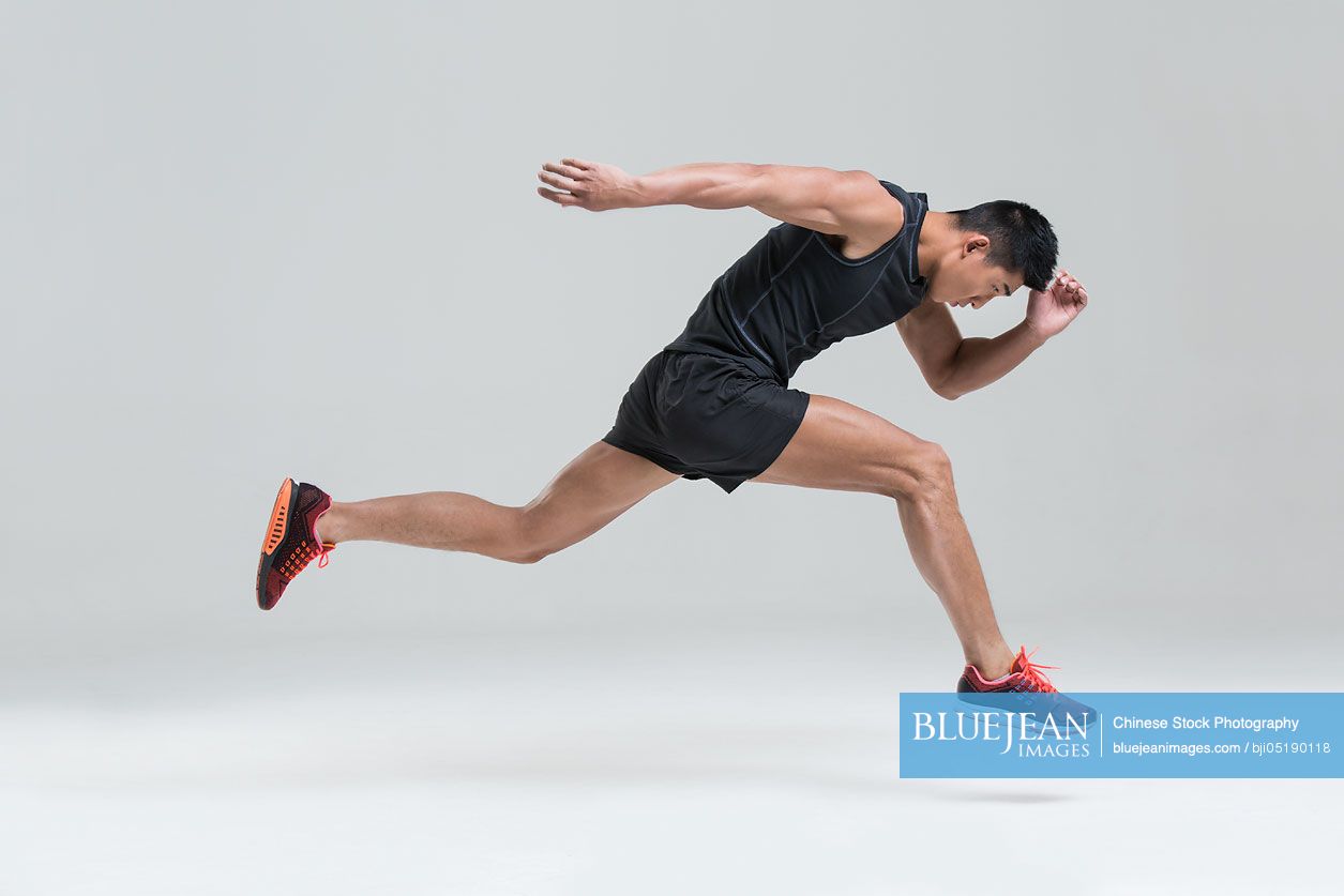 Male Chinese athlete running