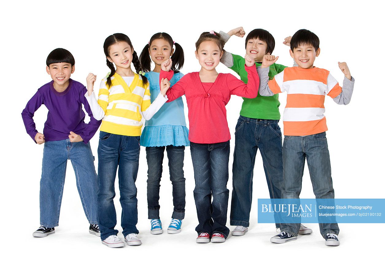 A group of Chinese friends flexing their muscles together