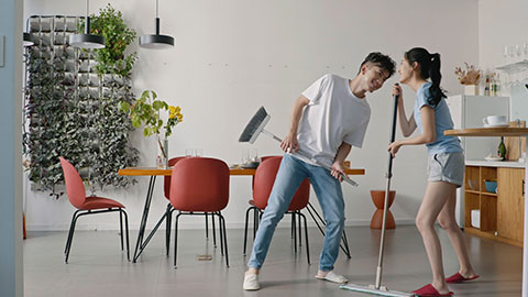 Cheerful young Chinese couple doing housework,4K