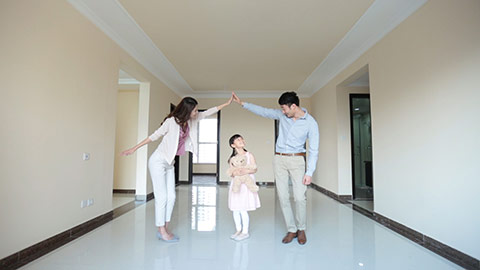 Happy young Chinese family in their new house,HD