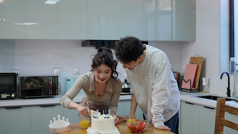 Young couple enjoying a special birthday celebration