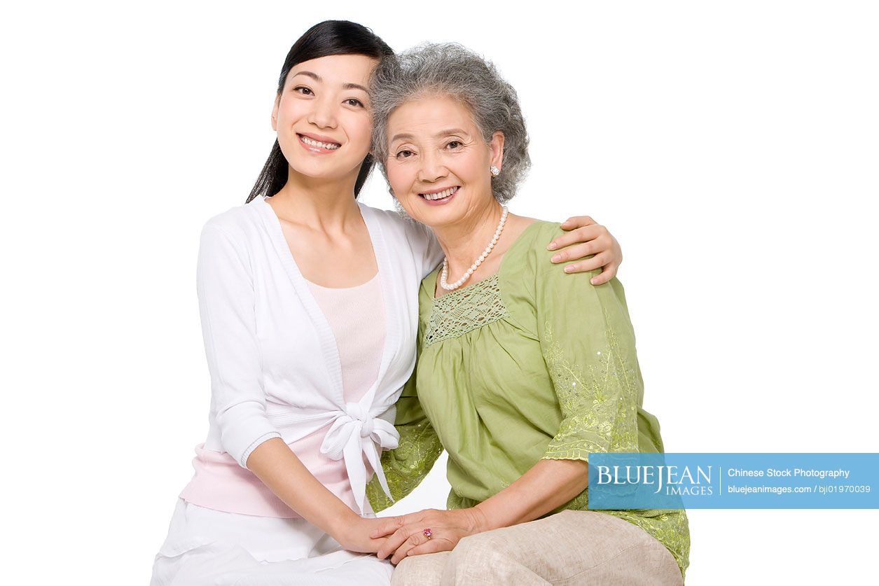 Portrait of Chinese mother and adult daughter
