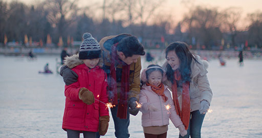 Happy young Chinese family celebrating Chinese New Year,4K