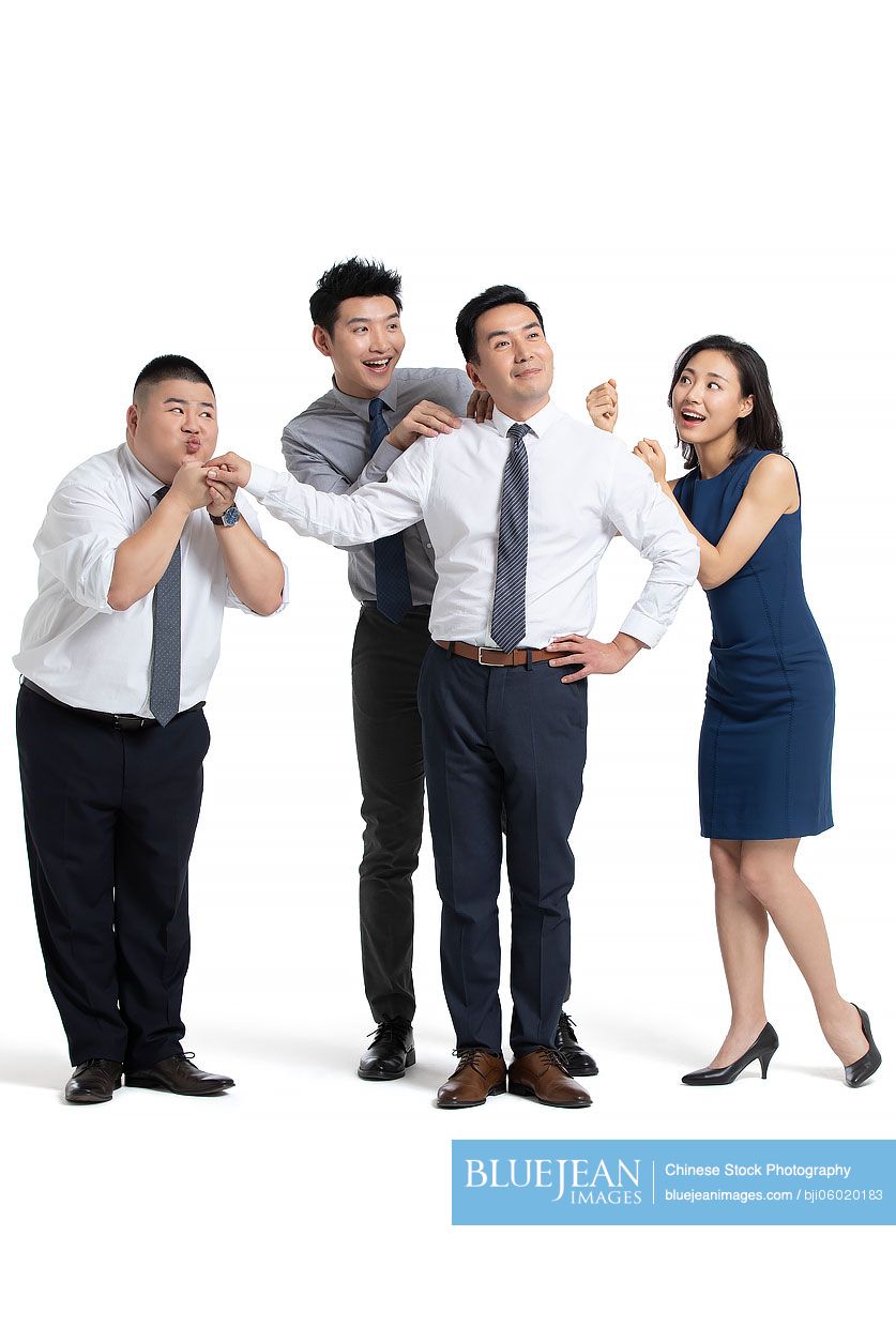 Bossy Chinese businessman being flattered