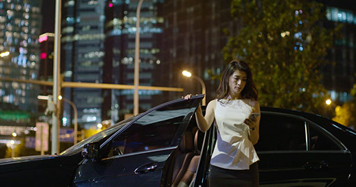 Successful Chinese businesswoman getting out of car,4K