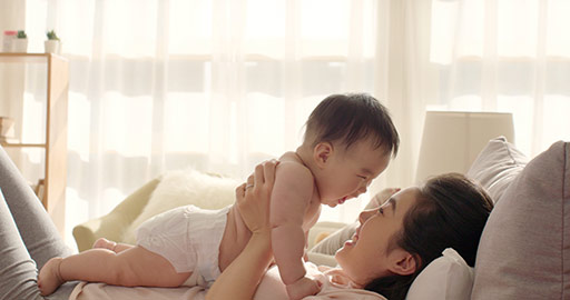 Young Chinese mom having fun with baby girl,4K