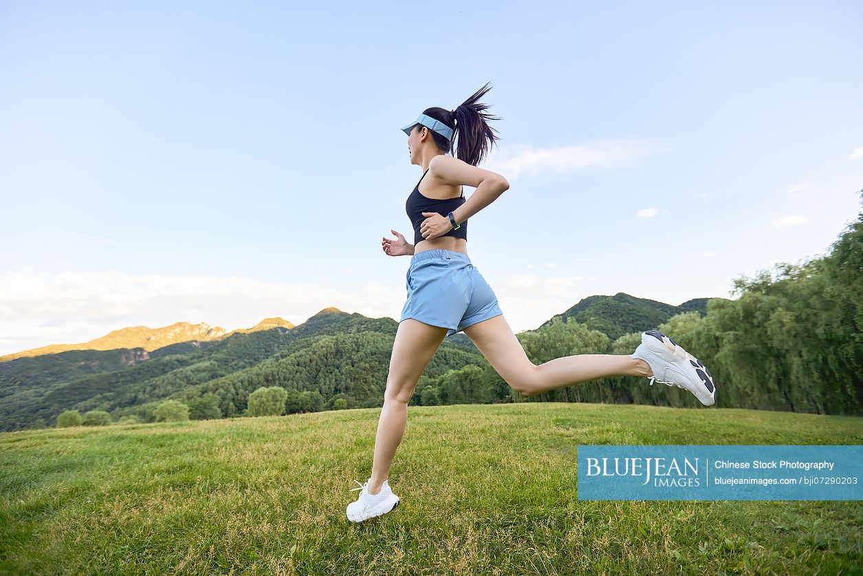 Young woman exercising in the heart of nature embracing the fresh air and natural surroundings