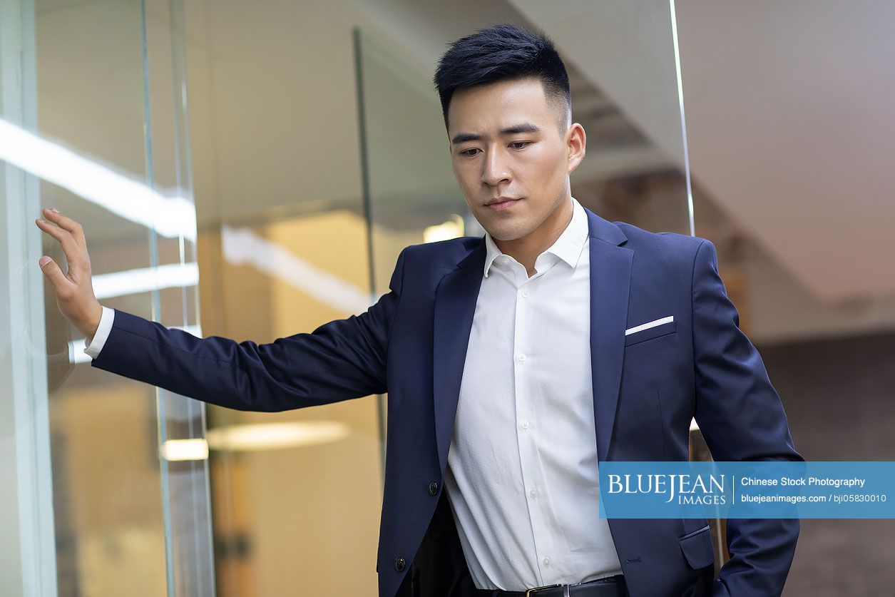 Confident young Chinese businessman