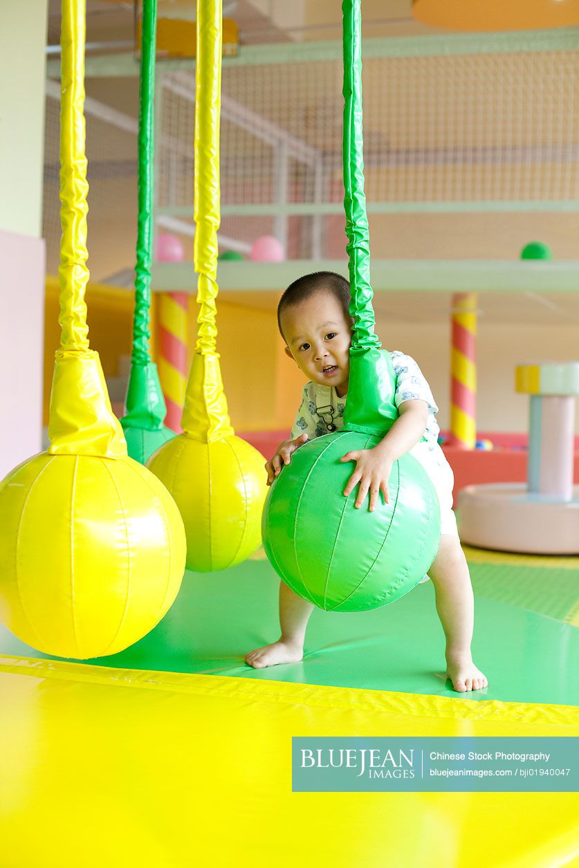 Chinese boy playing