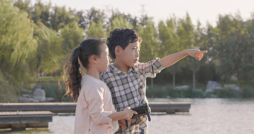 Happy Chinese children playing with remote control toy,4K