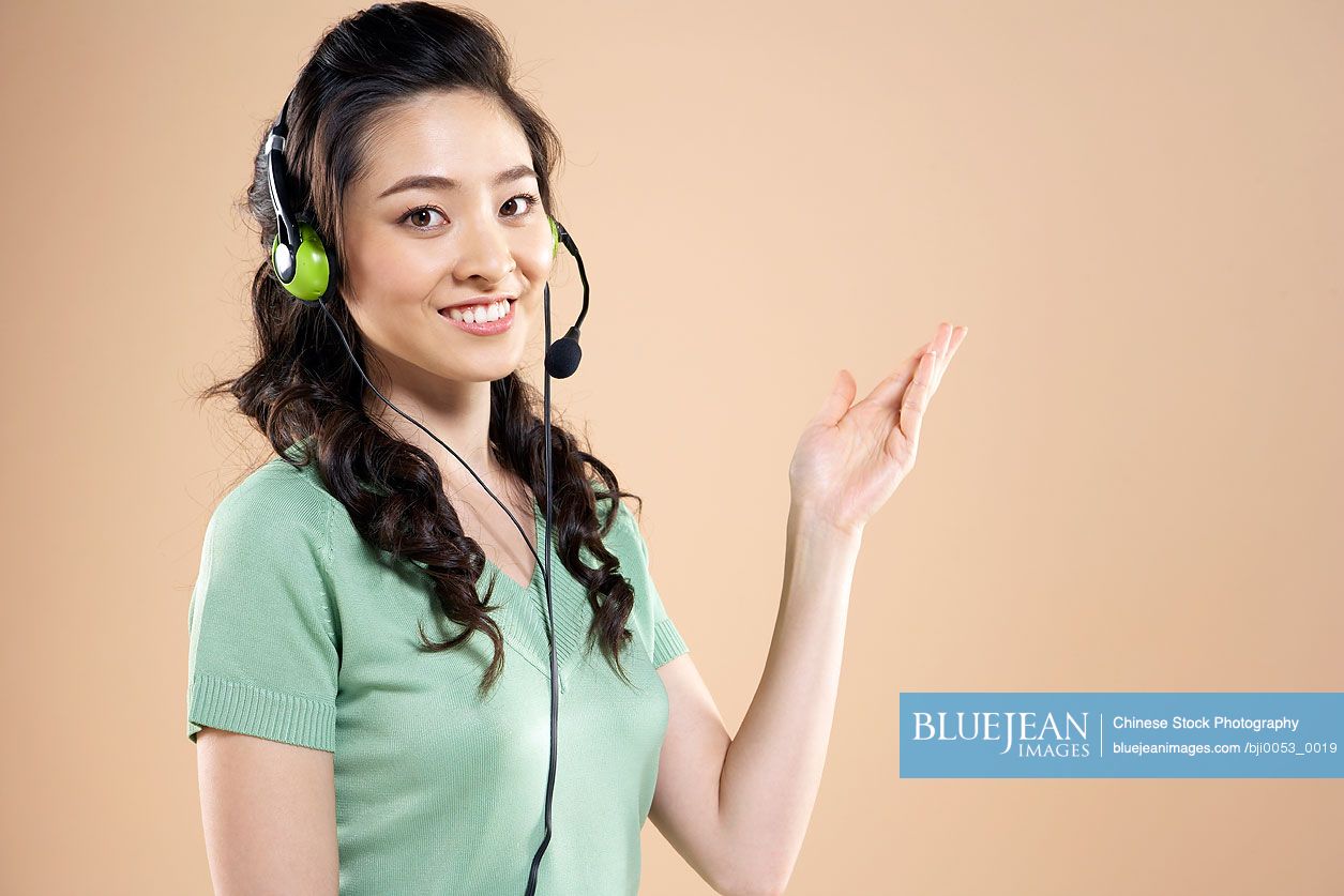 Chinese Woman Wearing Headset