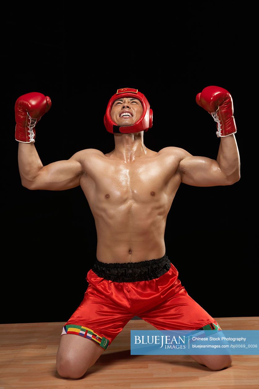 Kneeling Chinese Boxer Celebrating Victory