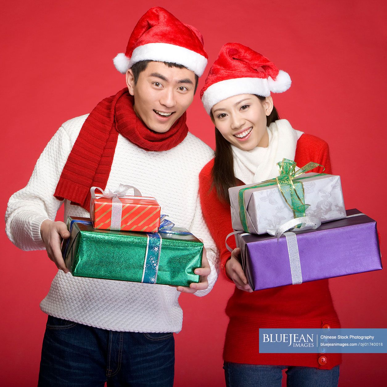 Young Chinese couple celebrating Christmas
