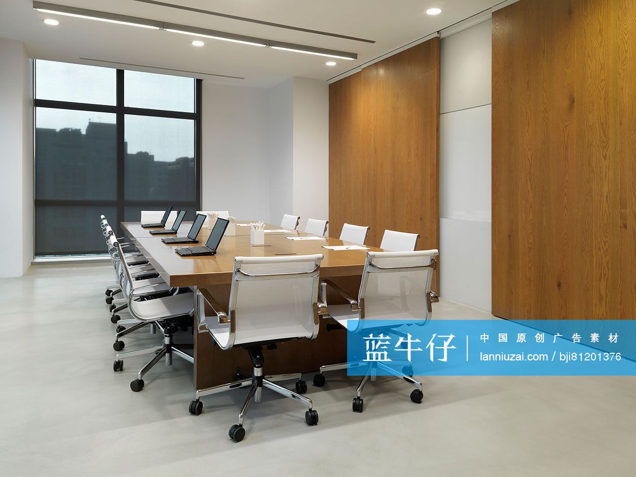 Laptops on conference table in office