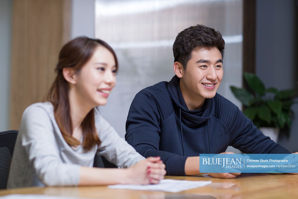 Chinese business people having a meeting in board room