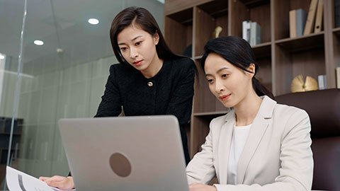 Confident Chinese business people having a meeting