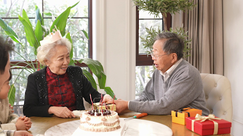 Family celebrating birthday with joy and laughter