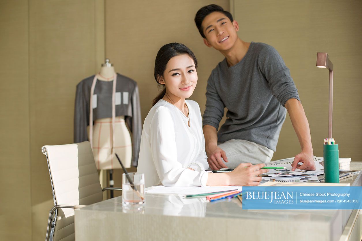 Portrait of two Chinese fashion designers-High-res stock photo for download