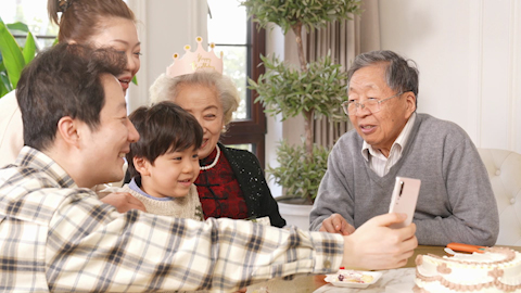 Family celebrating birthday with joy and laughter