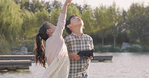 Happy Chinese children playing with remote control toy,4K